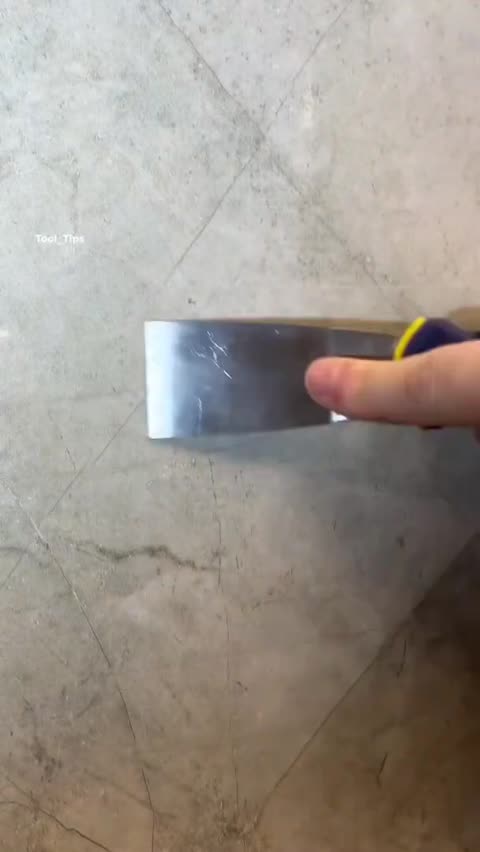 Hand Holding Lighter Heating Metal Blade Close-Up