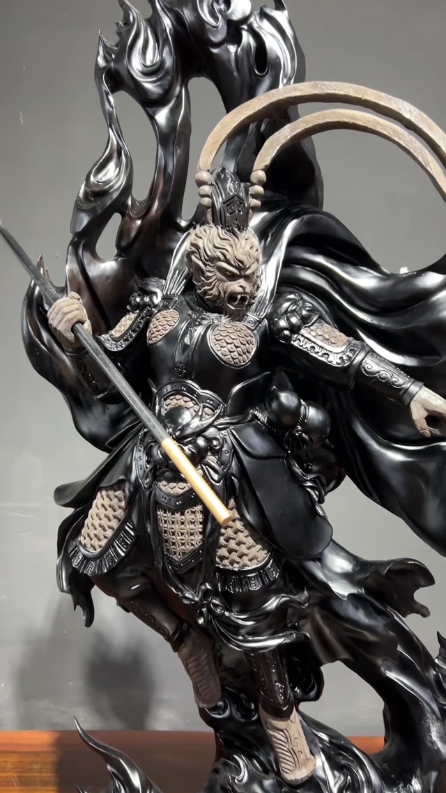 The Monkey King, carved from dark ebony wood. 